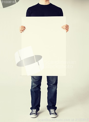 Image of man with blank white board