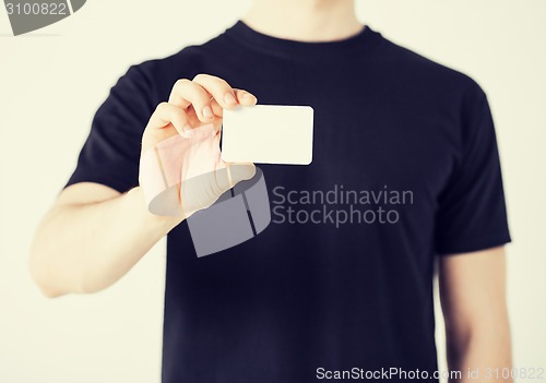 Image of man hand with blank paper