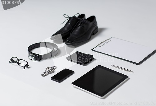 Image of close up of formal clothes and personal stuff