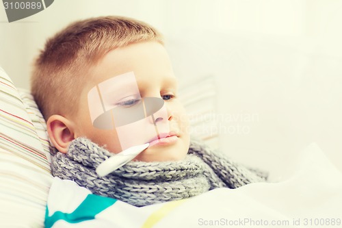 Image of ill boy with flu at home