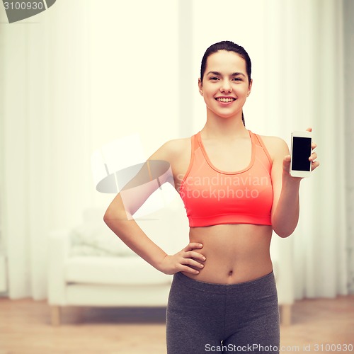 Image of sporty woman with smartphone