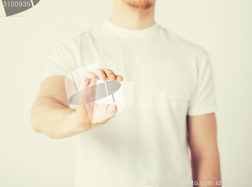 Image of man hand with blank paper