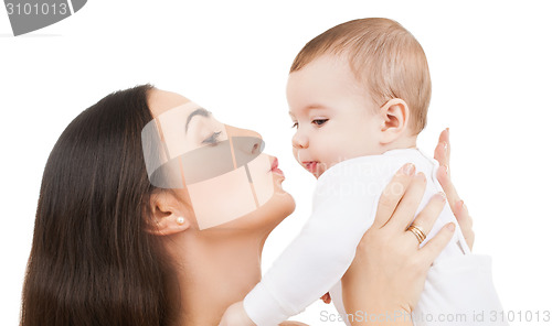 Image of mother kissing her baby