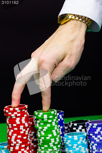 Image of Man's hand and stairs of the chips