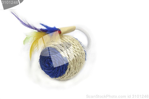 Image of round  toy for animals with feathers