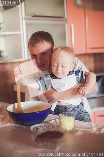 Image of Father and son cooking