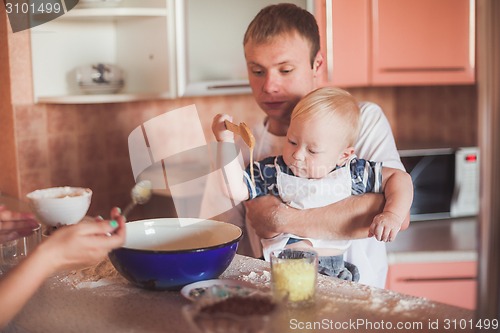 Image of Father and son cooking