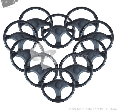 Image of steerings wheel have been laid out in a heart-shaped. collage