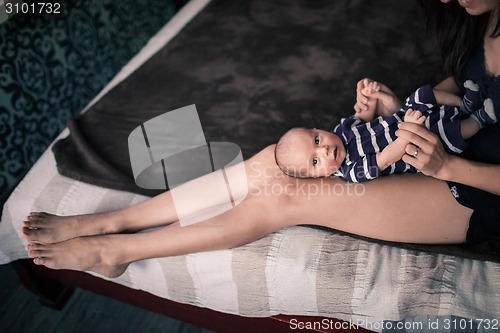 Image of Young mother with baby