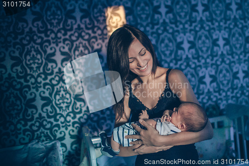 Image of Young mother with baby