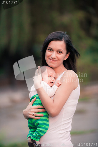 Image of Young mother with baby