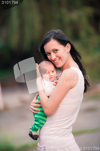Image of Young mother with baby