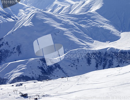 Image of Top view on ski slope at sun day