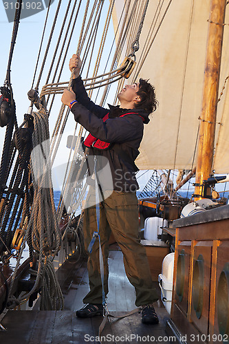 Image of Young sailor at work