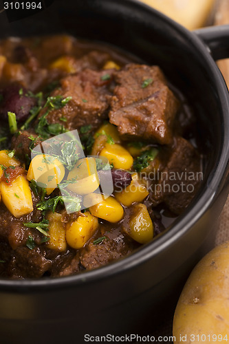 Image of Tasty winter traditional hot pot stew with meat and vegetables 