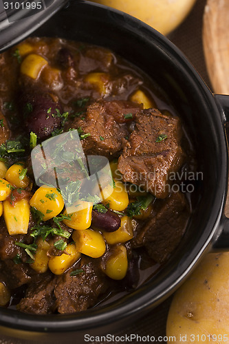 Image of Tasty winter traditional hot pot stew with meat and vegetables 