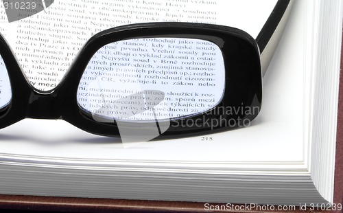 Image of Glasses on a book