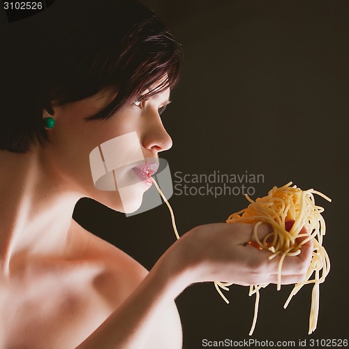 Image of woman with spaghetti