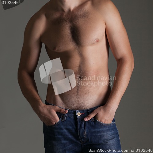 Image of Sexy muscular naked man in jeans 