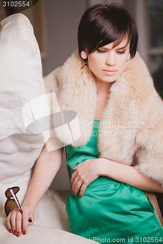 Image of Portrait of beautiful woman with brown hair.