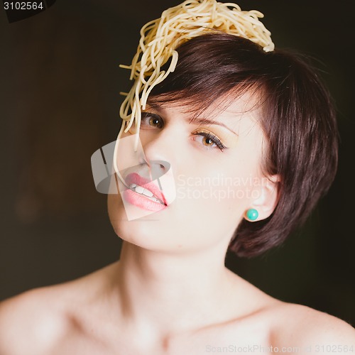 Image of woman with spaghetti