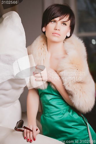 Image of Portrait of beautiful woman with brown hair.