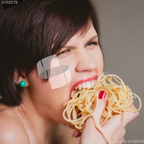 Image of woman with spaghetti