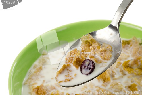 Image of Spoonful of cereal with milk

