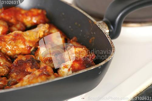 Image of chicken wings in grill pan