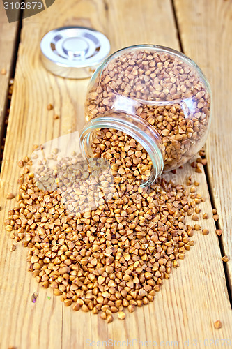 Image of Buckwheat in glass jar and on board