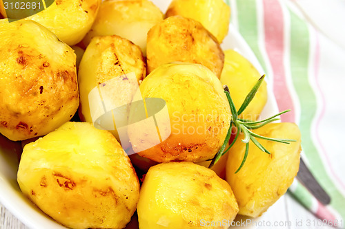 Image of Potatoes fried on plate with napkin