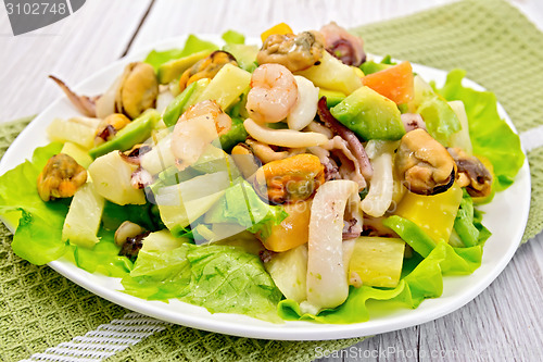 Image of Salad seafood and avocado on light board