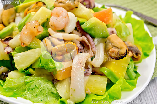 Image of Salad seafood and lettuce on light board
