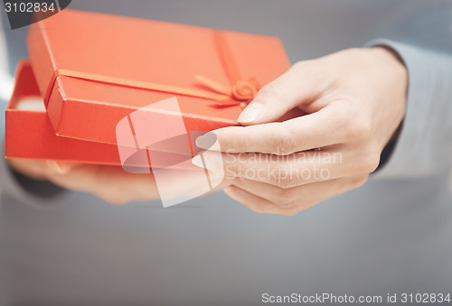 Image of Woman with gift box