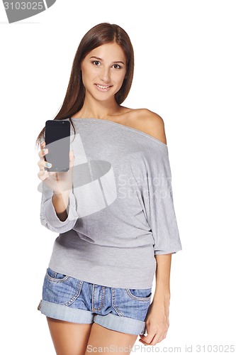 Image of Young woman showing mobile cell phone