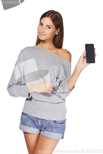 Image of Young woman showing mobile cell phone