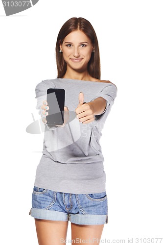 Image of Young woman showing mobile cell phone