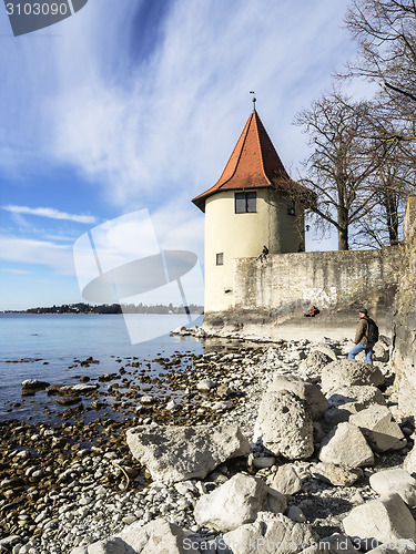 Image of Lake Constance with rocks and tower