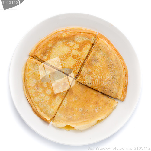 Image of Pancakes stacked on a plate.