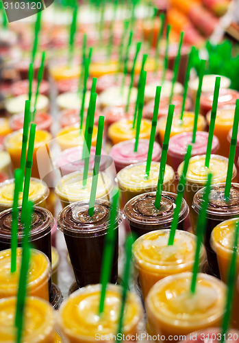 Image of Plastic cups with fresh cocktails