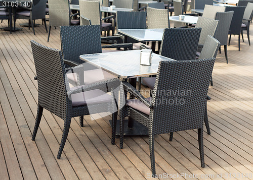 Image of empty interior of the summer restaurant