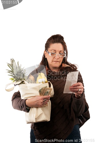 Image of Grocery Shopper Reviewing Receipt