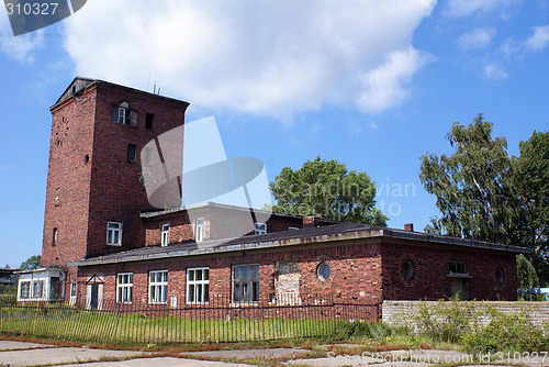 Image of Brick house with tower