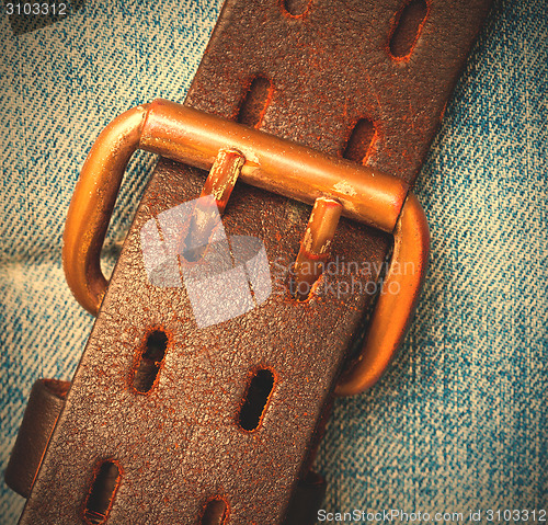 Image of vintage leather belt with buckle
