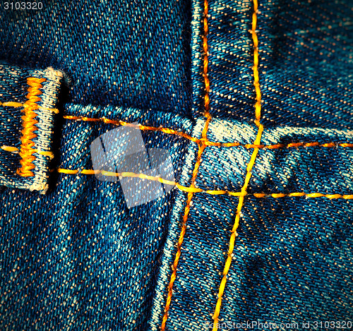 Image of Crossed seams on jeans