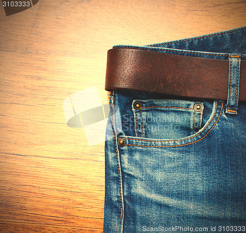 Image of Aged blue jeans