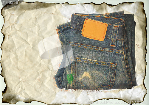 Image of aged jeans on old paper