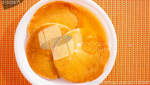Image of pancakes with honey