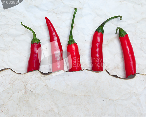 Image of fiery red chili peppers