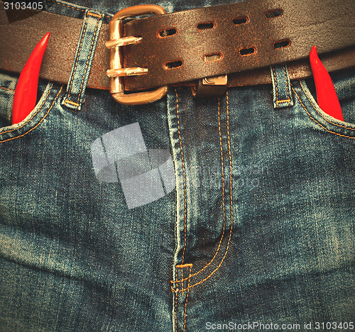 Image of jeans with red chili pepper